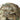 Camouflage-pattern Cordura backpack with zip front pocket and padded shoulder straps