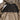 Packable rain jacket interior lining and mesh panel, hidden pocket area