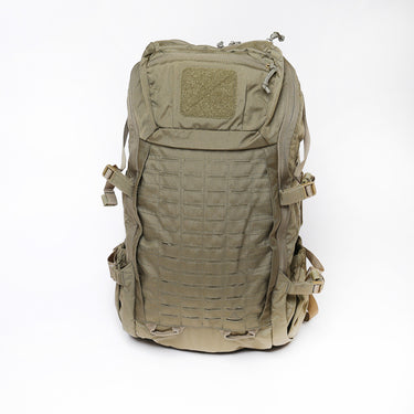 Tactical backpack in olive tan with front padded panel and side attachment straps