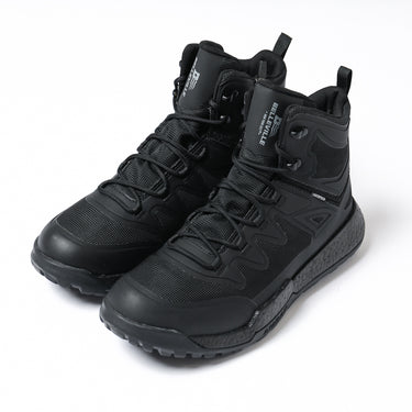 Black mid-cut tactical boots with side zipper and lace-up closure