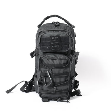 Black tactical one-strap assault pack with front zip pockets and MOLLE panels
