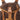 Brown kit bag with top handle, front buckle, and tan trim webbing