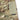 Camo tactical shirt sleeve pocket with flap, stitching, and Pentagon logo patch