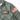 Sage green flight jacket back yoke with Cockpit USA label and US flag patch