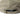 Beige mesh baseball cap interior with adjustable strap and brand label