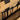 Tan double pistol case side row of elastic loops with close webbing divider