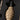 Tan grenade-shaped tool head with black attachment in foam tray