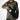 CCW sling bag in dark fabric, worn crossbody with front pouch and adjustable strap