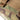 Multicam utility pouch fabric close-up with stitched edges and webbing loop