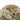 Multicam baseball cap side panel with tan hook-and-loop patch detail
