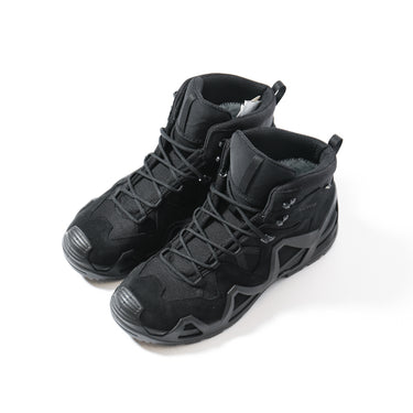 Black mid tactical boots with lace-up front, padded collar, and textured toe cap