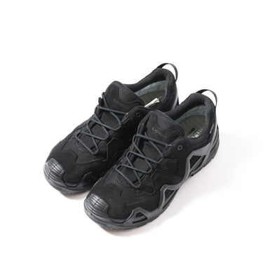 Black low tactical boots with lace-up closure and grippy rubber outsole.