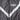 Dark grey army jacket close-up: zip track and white chevron stripe