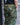 Green camo combat pants with multiple cargo pockets and reinforced knee