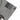 Gray T-shirt sleeve with American flag patch and small brand tag near hem