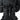 Black backpack front with dual buckles, straps, and vertical webbing on panel
