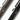 Close-up of tactical aluminum defender pens, gunmetal and black with UZI markings