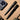 Two tactical bolt action pens, gun metal and black, both with keyrings.