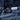 Designed in Poland label on dark blue denim skirt