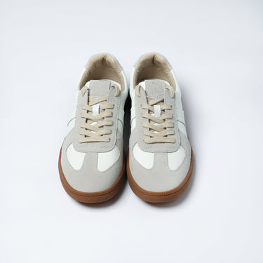 White low-top leather trainer with beige laces and gum rubber sole, RTB branding