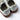 White trainer heel view with RTB logo on suede pull tabs and gum rubber sole