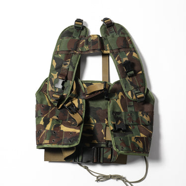 Camouflage load-bearing vest with front harness straps and multiple buckle fasteners