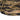 Windrunner windshirt in woodland camouflage, close view of striped chest panel and hem