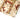 Tote bag bottom corner with desert camo canvas and tan webbing reinforcement