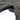 Dark gray fleece jacket hem with zippered opening and vented panel