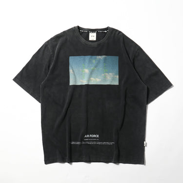 Black short-sleeve tee with chest graphic panel and “AIR FORCE” text near hem