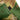 Camouflage shorts fabric close-up with small black size label patch