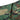 Woodland camouflage shorts front with zipper fly and snap button