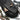 Black recurve takedown backpack with padded compartments and zippered accessory pockets