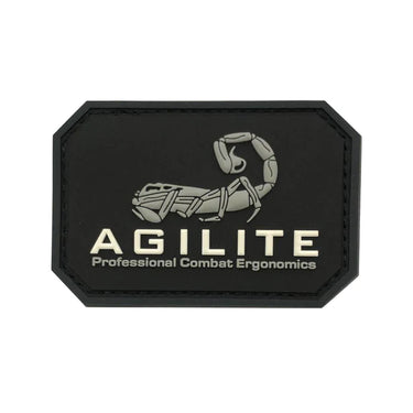 Black octagonal logo patch with stitched edge and beige Agilite emblem