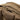Tan assault pack strap area with ventilated mesh panel and stitching