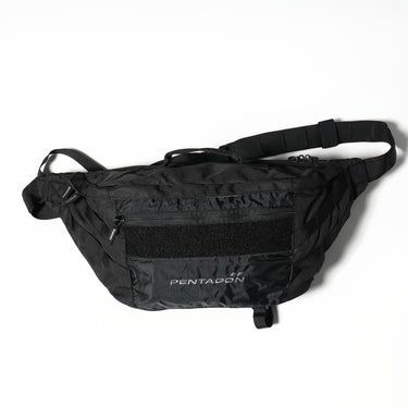 Telamon sling bag, black with front zip pocket and adjustable shoulder strap