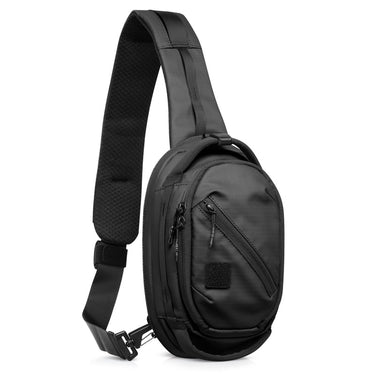 Black crossbody sling bag with front zip pocket, side zippers, and adjustable strap