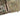 Multicam plate carrier side panel with MOLLE webbing and buckle