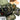 Olive camo pistol sleeve pouch with zip compartments and webbing panels
