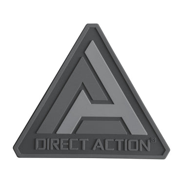 Black triangular rubber logo patch with Direct Action lettering