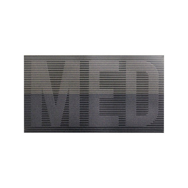 Subdued IR patch with large 'MED' lettering, dark gray on textured fabric