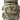 25L tactical backpack close-up in woodland camouflage with front zipper and patch panel
