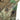 Camo poncho panel with dark grommet and reinforced snap button