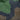 Waterproof ripstop fabric with raindrops on green and dark camouflage pattern