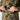 Camouflage anorak jacket sleeve cuff and front pocket zipper with metal pull