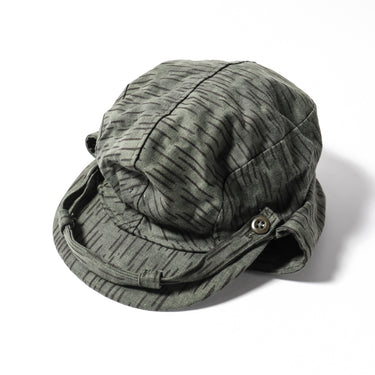 Raindrop camo field cap with buttoned chin strap and curved brim