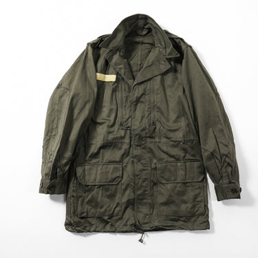 Olive drab combat parka with hood, drawstring hem, and front utility pockets