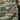 Camouflage field jacket side patch pocket with flap and grey fabric tab