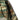 Camouflage field jacket sleeve with reinforced elbow patch and dark cuff trim