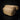 Tan nylon waist concealment pouch with zippered front pocket and Pentagon logo
